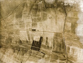 Transport tracks and bomb craters. One of a series of British aerial reconnaissance photographs