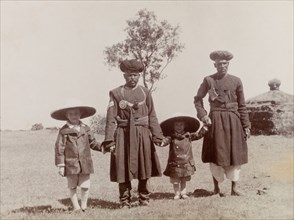 The Lawrence boys with Indian attendants. George (b.1899) and Henry (b.1902), the sons of Phyllis