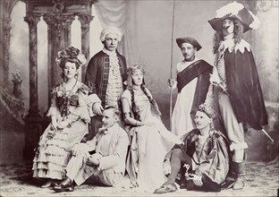 British amateur dramatics in India. Group portrait of British actors wearing fancy dress costume