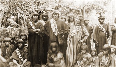 Peruvian men, women and children. A group of indigenous Peruvian men, women and children pose