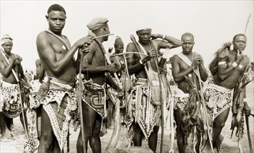 Nigerian hunters with bows and arrows. Portrait of a group of Nigerian hunters with bows and arrows