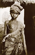 Portrait of a Hausa girl. Portrait of a young Hausa girl wearing traditional patterned robes and a