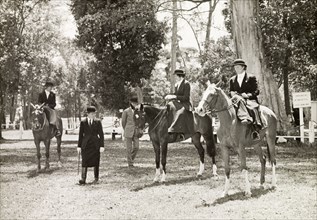 Siddle-saddle' class at Nairobi Show. Three ladies participating in the 'siddle-saddle' class at