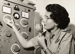Kenya Police Airwing radio operator. Rosalind Balcon operates a radio in the communications room of
