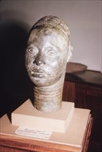 Yoruba bronze sculpture. A bronze sculpture of a head, possibly a royal or religious effigy, from