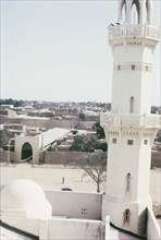 A minaret of Kano Central Mosque. View of a minaret at Kano Central Mosque and the town beyond.