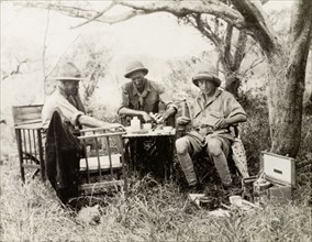 Prince Edward of Wales on safari. Prince Edward of Wales (right), later King Edward VIII, sits at a