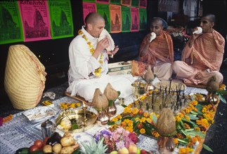 Hare Krishna stall at religious street festival. Members of the International Society for Krishna