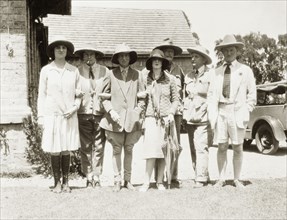 Evelyn Waugh and friends visit the Kakamega goldfields. Evelyn Waugh (1903-1966) (far right) poses