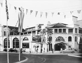 New Stanley Hotel, Nairobi. Bunting decorates the street outside the New Stanley Hotel in
