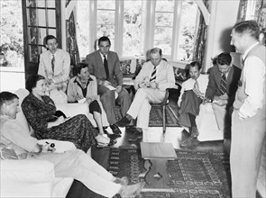 Kenyan press conference for the death of King George VI. A group of European journalists gather