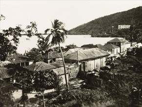 Tortola. View over a coastal settlement on the island of Tortola to the Caribbean Sea. Tortola,