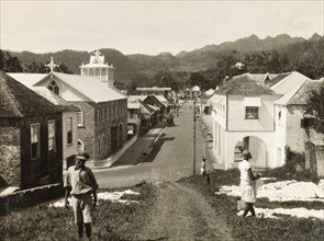 Kingstown, St Vincent. View down an colonial street in Kingstown towards the central mountain range
