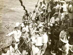 Crossing the line' ceremony. Crew members dressed in costume as King Neptune and his court for a