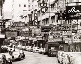Cameron Road, Kowloon. English shop signs and advertisements vie for attention on Cameron Road in