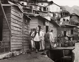 A squatter's settlement in Kowloon. A squatter's settlement in Kowloon. An original caption