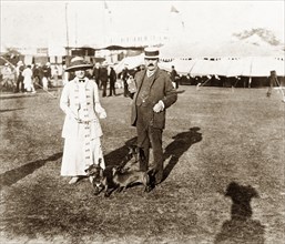British couple at a dog show, Calcutta. James and Minnie Murray pose with their prize-winning