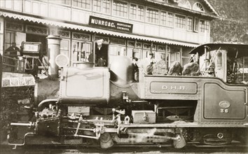 Steam train at Darjeeling station. A steam locomotive stops at Darjeeling station on the Darjeeling
