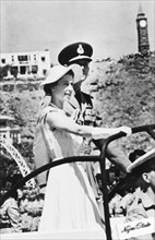 Queen Elizabeth II visits Aden, 1954. Queen Elizabeth II inspects a parade of troops during a visit