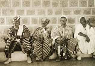 Ghanaian chiefs at a conclave. Four Ghanaian chiefs attend a conclave in traditional dress.