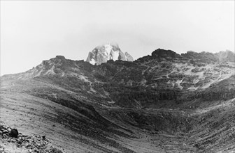 Mount Kenya, 1936. The summit of Mount Kenya is partially obscured by cloud. Kenya, circa 1936.