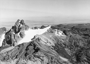 Batian Peak at Mount Kenya, 1936. An aerial view of Batian Peak, the highest peak of Mount Kenya at