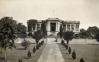 Prime Minister of Indore's palace. View along an avenue of newly-planted trees to the pillared