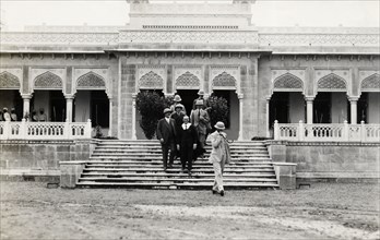 Daly College, Indore. The headmaster of Daly College conducts a tour of the grounds and facilities