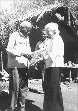 Kamante with Ingrid Lindstrom. Kamante, once head servant and cook for Baroness Karen Blixen, shows