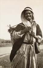 Portrait of a Palestinian bedouin man. Portrait of a smiling bedouin man, who carries a large