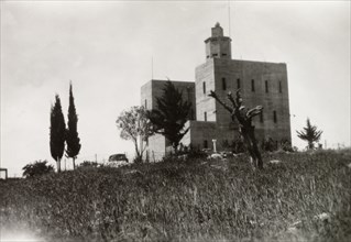 Fortified police building, Palestine. View of a large, fortified building with a projecting