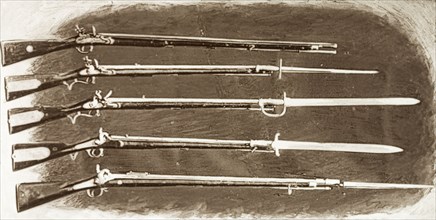 Muskets used during the Indian Mutiny and Rebellion . An illustration depicts a collection of
