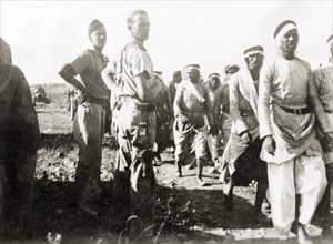 Escorting Arab detainees, Palestine. British soldiers escorts a column of Palestinian Arab men