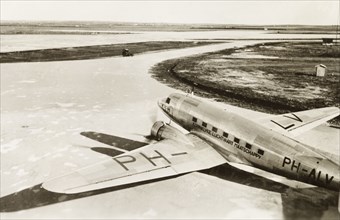 Dutch aeroplane on Lydda runway. A KLM Royal Dutch Airlines aeroplane, the PH-ALV 'Valk', sits on