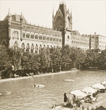 Calcutta Swimming Club, 1938. European bathers relax in and around the pool at Calcutta Swimming