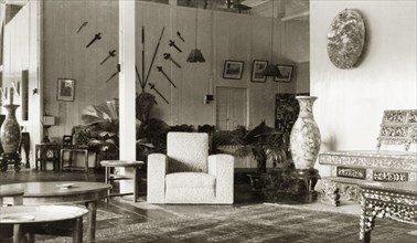 Drawing room of a colonial bungalow, British Malaya. Interior shot of a bungalow drawing room