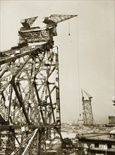 The Howrah Bridge under construction, 1940. The Howrah Bridge under construction across the Hooghly