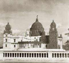 The Victoria Memorial in disguise, 1941. The Victoria Memorial is covered with bamboo scaffolding