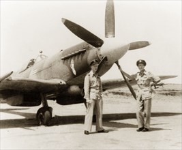 Posing beside a Supermarine Spitfire. Roland Britton (left), a fighter pilot in No. 17 Squadron of