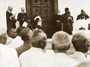 Dedication of Tumkur seminary chapel. Indian and European missionaries address a seated audience at