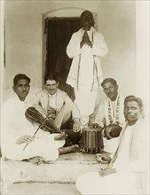 A Methodist evangelist band. Group portrait of a Methodist evangelist band, instruments in hand,