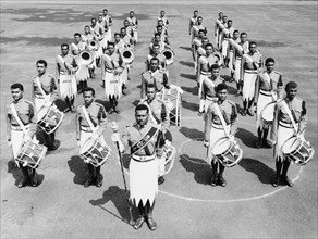 Royal Fijian Military Band. Fronted by a Drum Major holding a staff, the 32-piece Royal Fijian