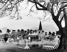 Churchyard on Nevis. A cemetery overlooking the sea on the Caribbean island of Nevis. Nevis, 1965.