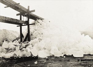 Freshly cut ice, Canada. A pile of ice freshly cut from Lake Ontario sits at the foot of a chute