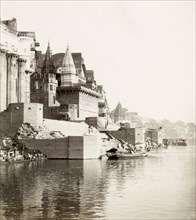 Ghat on the River Ganges, Benares. View of a ghat (stepped wharf) situated on the River Ganges at