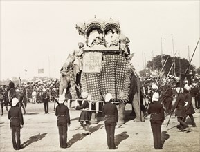 Maharajah of Patiala on state elephant, 1903. The Maharajah of Patiala travels inside an ornate