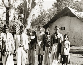 Evangelists visiting plantation workers, India. Two Methodist evangelists, J.A. Dennis and Monahan