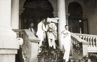 Departing the Prime Minister of Indore's palace. British and Indian officers dressed in full