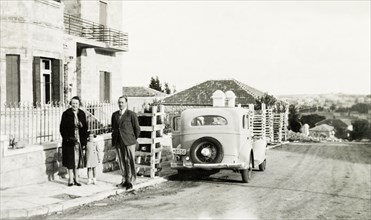 The Jones family in Jerusalem . The British Jones family stand on the pavement outside a house in