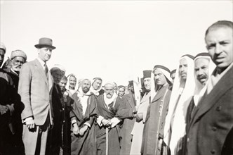 William Ryder McGeagh meets Arab villagers. William Ryder McGeagh (centre), District Commissioner